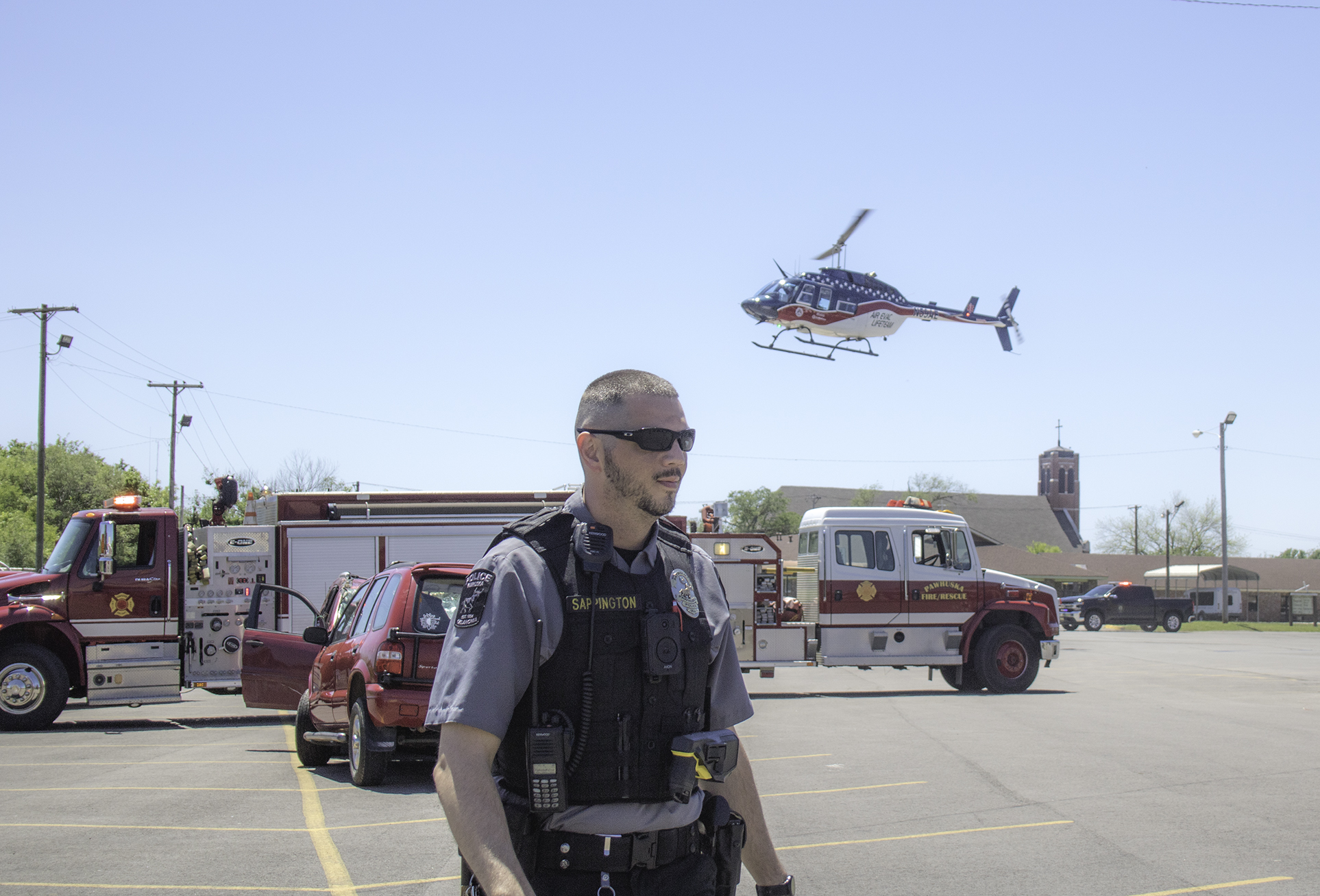 Life Flight helicopter and police officer