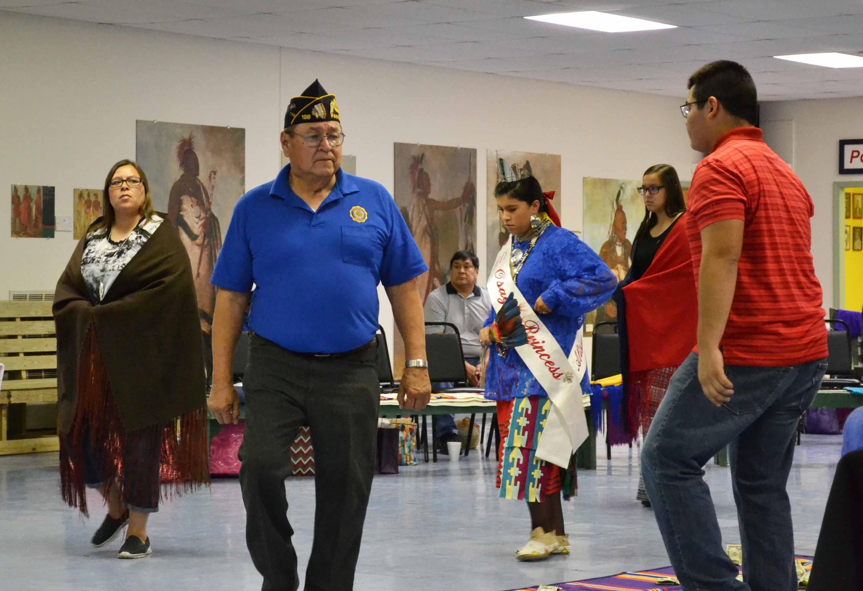 Executive Advisor, Johnny Williams, dances during a Veterans Day blanket dance at the Post Legion 198 Annual Veterans Day Dance